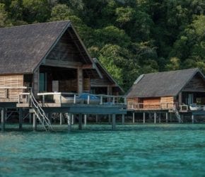 Beautiful Overwater Bungalows and crystal clear lagoons at Bawah Reserve, Indonesia