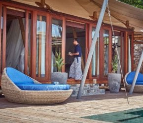 Room service at the pool villa bedroom, deck and private pool, on private island sustainable resort Bawah Reserve, Indonesia