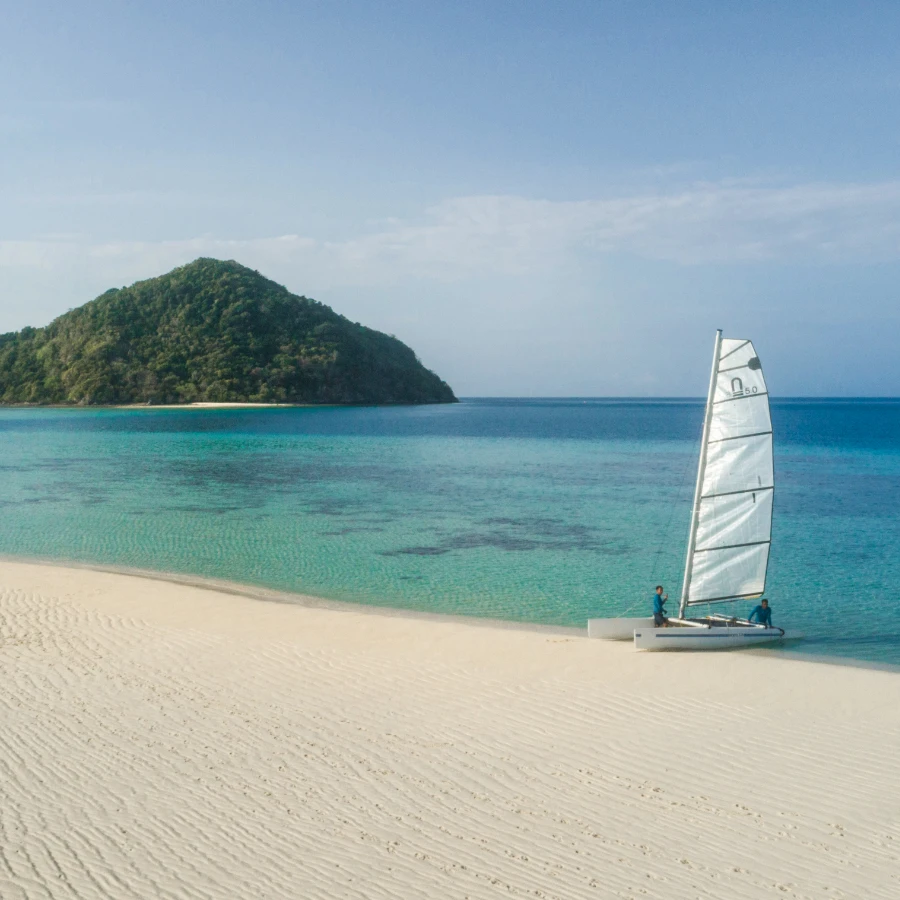 Activities at Bawah Reserve include sailing these catamarans.