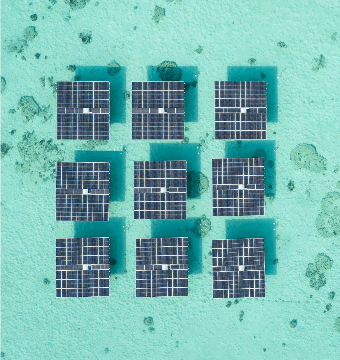Bawah Reserve, floating solar panel farm, 6 panels in the lagoon.