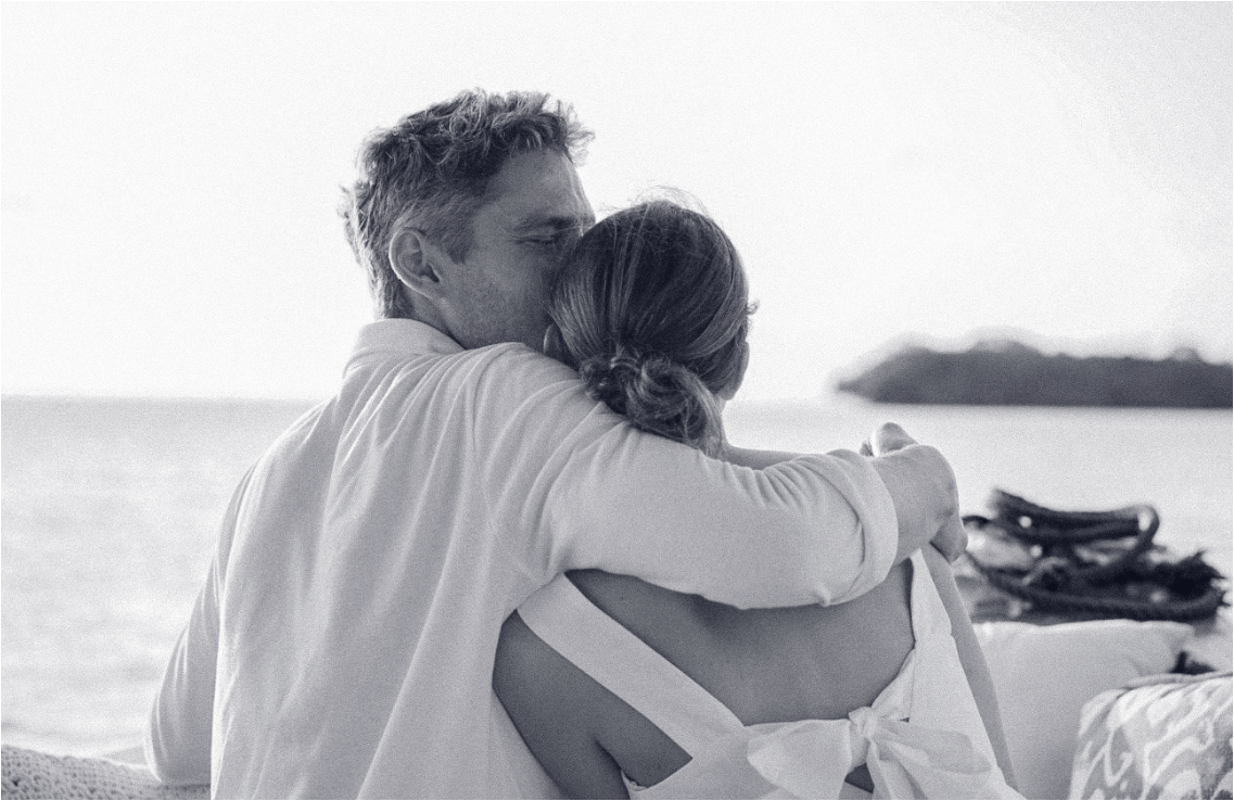 Romantic anniversary couple enjoying sunset cruise at Bawah Reserve, Indonesia, private island hotel and resort.