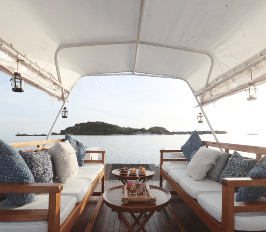 Sunset cruise with drinks and canapes dining experiences at Bawah Reserve, Indonesia.
