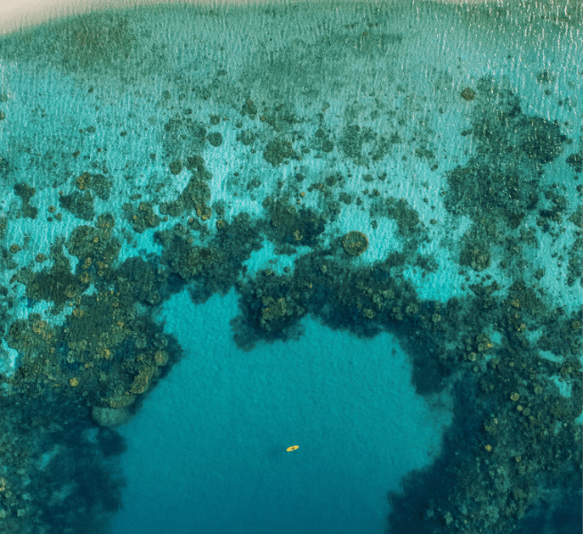 Activities at Bawah Reserve, Indonesia. Stand up paddleboarding and kayaking.