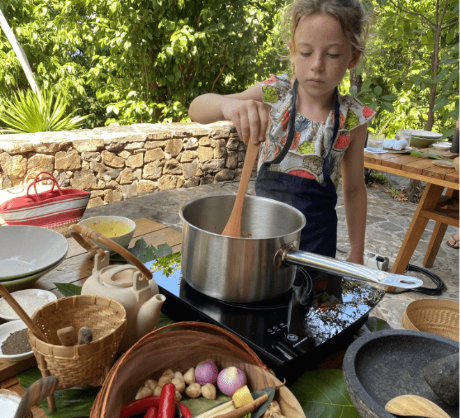 Activities at Bawah Reserve, Indonesia. Children's cooking class.