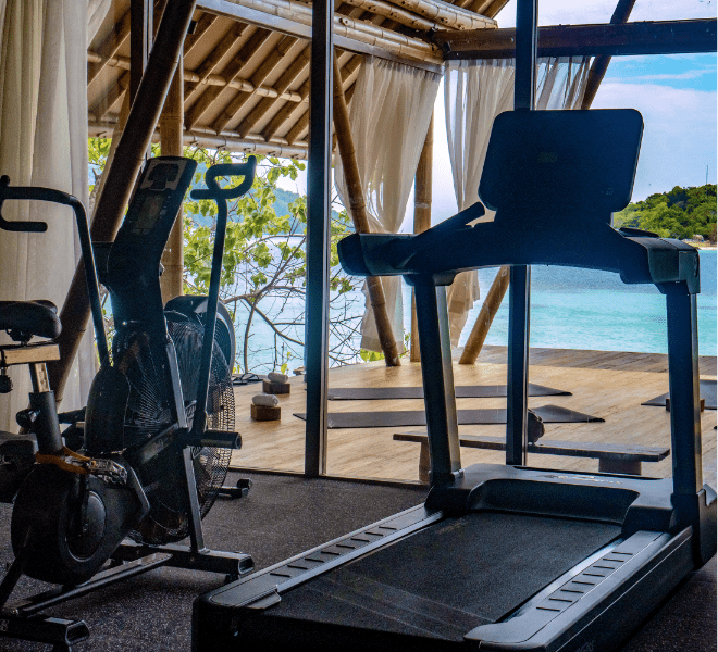 Activities at Bawah Reserve, Indonesia, gym with running machine and exercise bike.