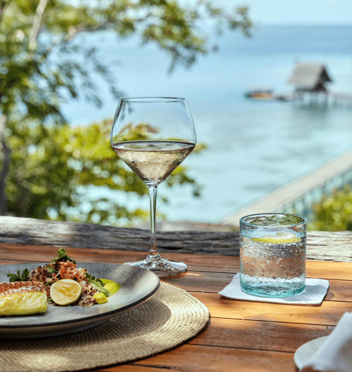 Treetops hotel restaurant on private island Bawah Reserve, Indonesia. Wine and lunch with a view.
