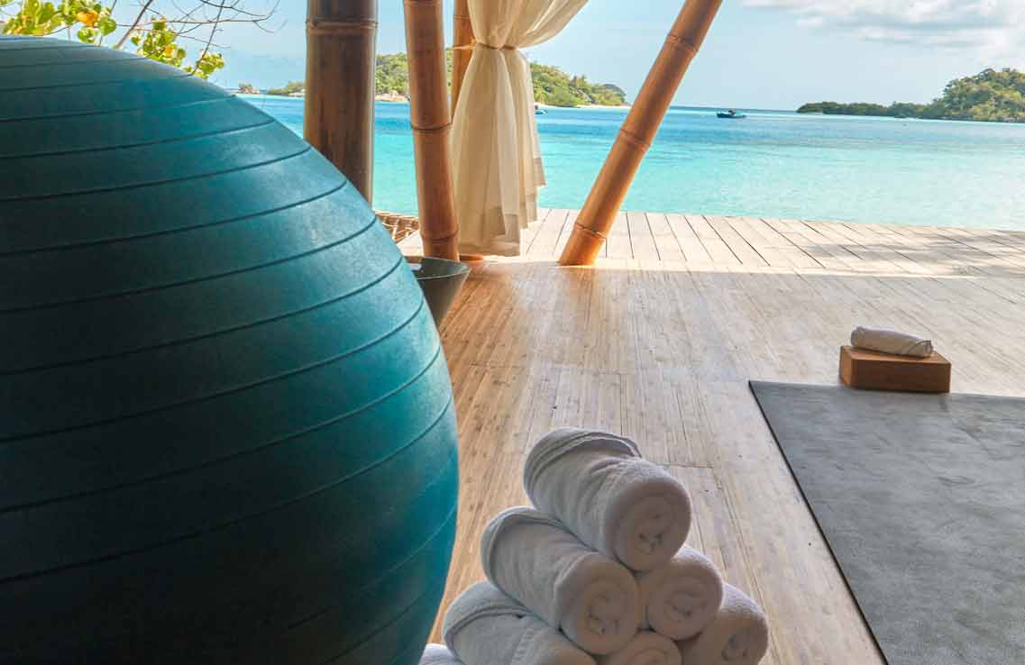 Aura yoga and pilates deck at Bawah Reserve, private island resort and hotel, Indonesia.