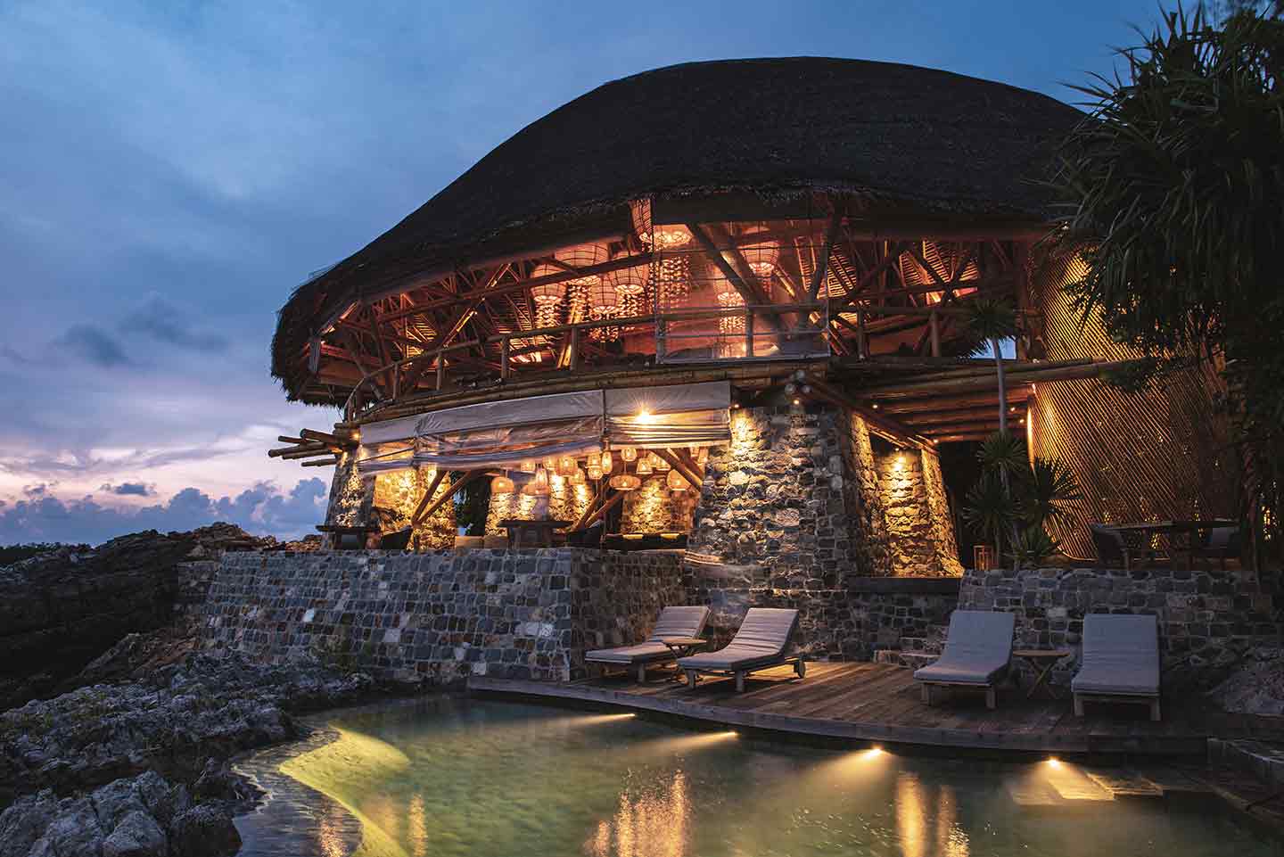 elang-at-dusk-lights-up-sun-lounger-pool-club-house