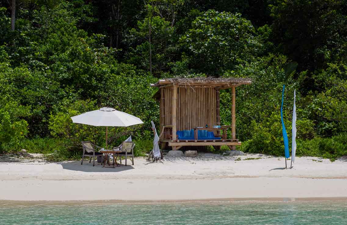 Private island beach picnic, Coconut beach, Bawah Reserve, Indonesia