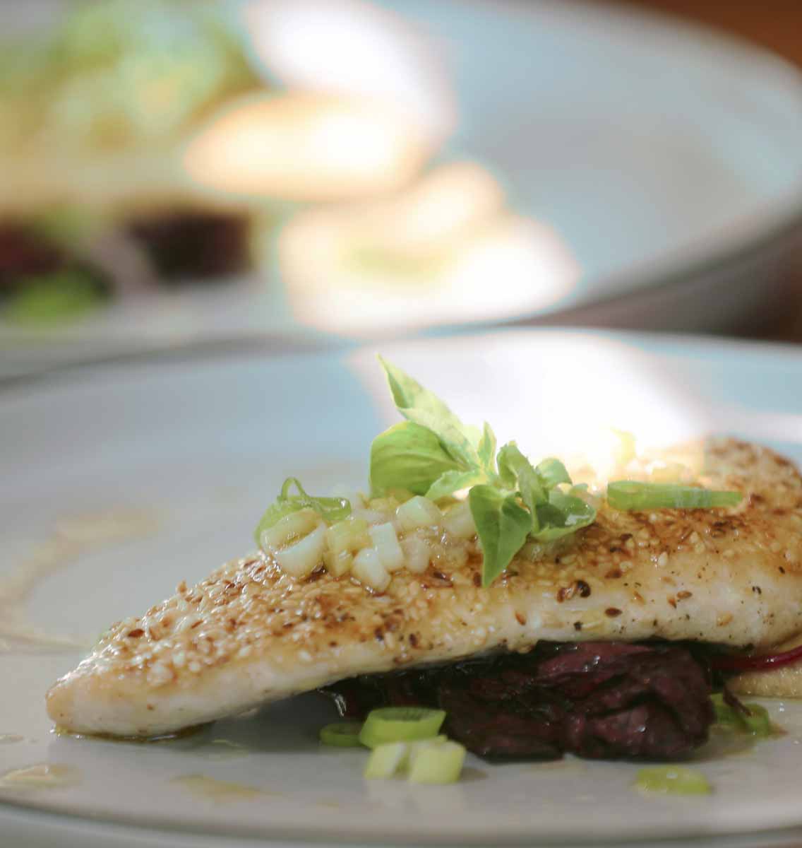 Grilled fish, dining at Bawah Reserve, indonesia Treetops hotel resort restaurant.